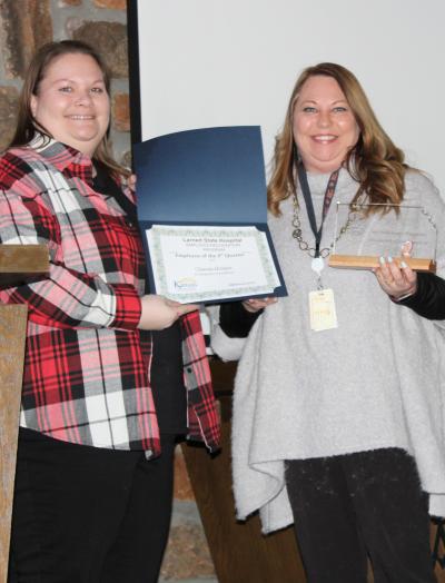 Superintendent Lindsey Dinkel presents Employee of 4th Quarter award to Chianna Hemken.